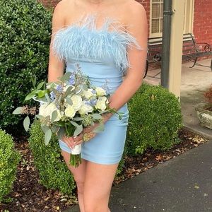 Stunning Blue, strapless dress with feather detail! Great for a school dance!